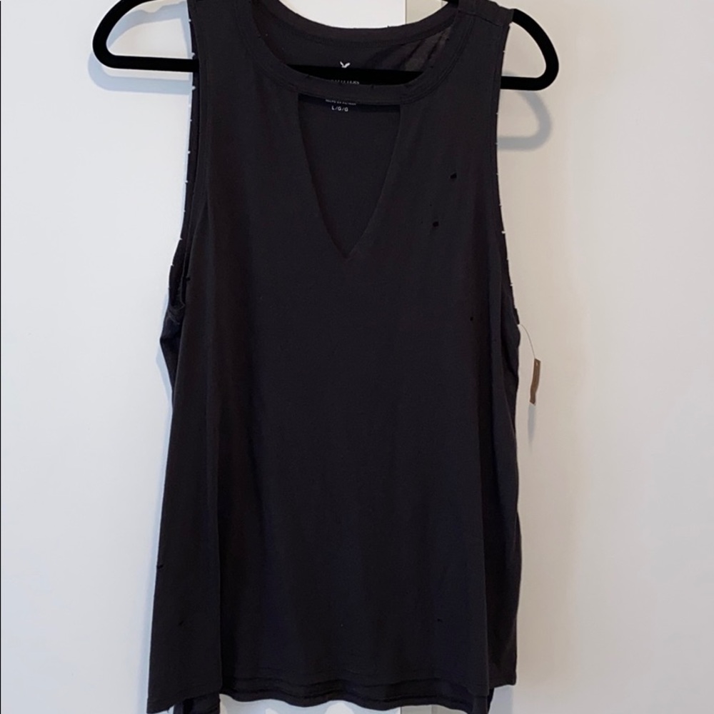 Distressed cut out V neck tank top. Size L
